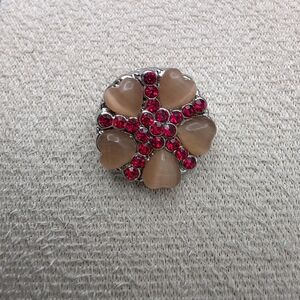Elegant Heart-Shaped Red and Tan Snap Button Accent (1886)
